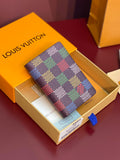Louis Vuitton checkered small wallet with multicolor pattern and brown leather trim