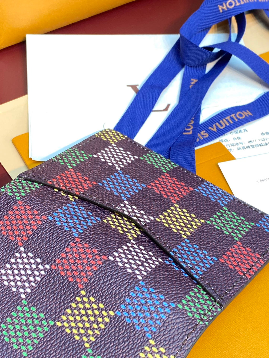 Louis Vuitton checkered small wallet with multicolor square pattern and leather trim