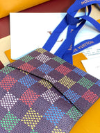 Louis Vuitton checkered small wallet with multicolor square pattern and leather trim