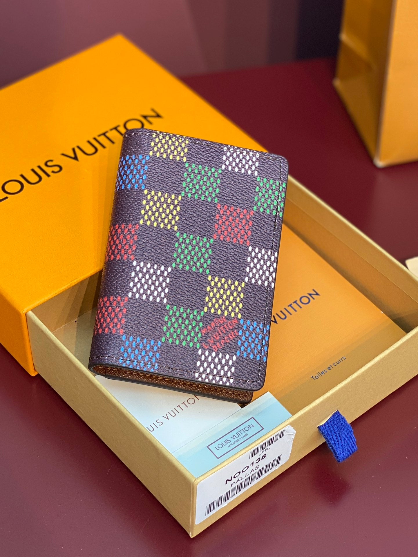 Louis Vuitton checkered small wallet with multicolor squares and brown leather trim
