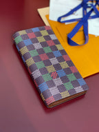 Louis Vuitton multicolor checkered small bag with smooth trim and front panel