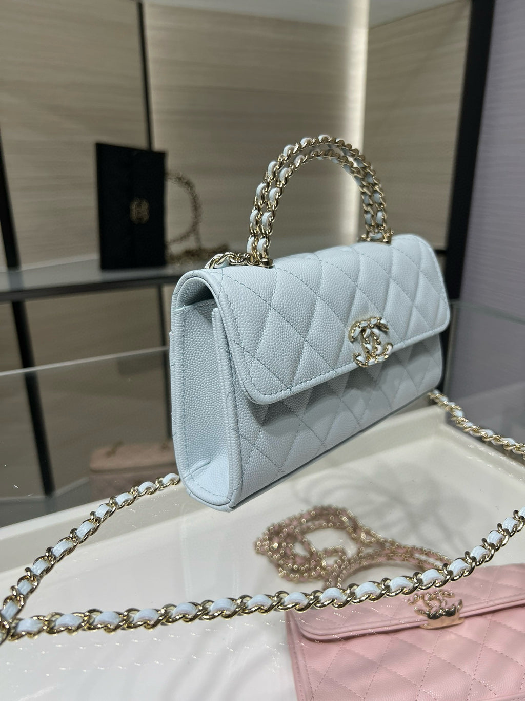 Chanel light blue quilted crossbody bag with gold chain strap