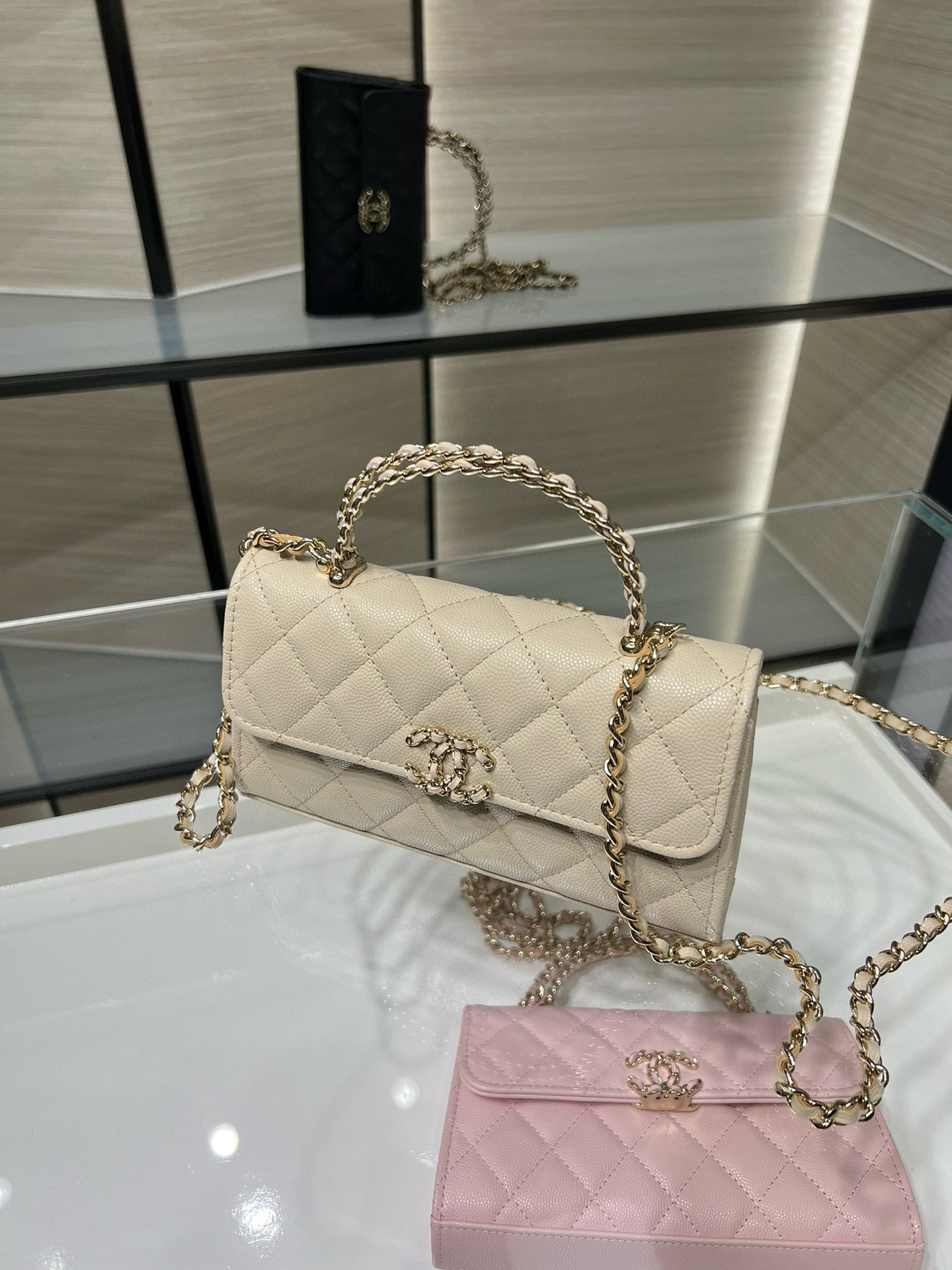 Chanel cream quilted mini flap bag with gold chain strap