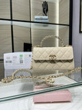 Chanel cream quilted flap shoulder bag with gold chain strap