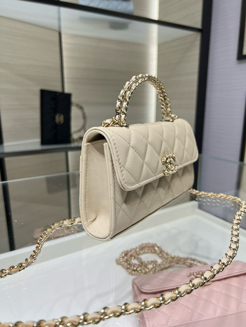 Chanel cream quilted flap shoulder bag with gold chain and front clasp