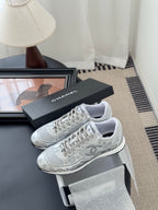 Chanel unisex white sneakers with lace-up front and side logo, with shoebox