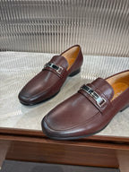 Prada unisex leather loafers, close side view, dark burgundy with buckle