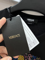 Versace T-shirt hangtag and neck label with colorful rhinestone graphic below