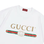 White Gucci T-shirt with large GUCCI logo and red-green stripe detail