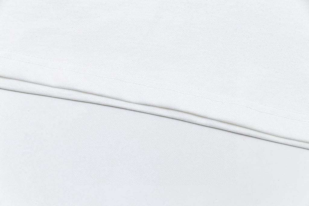 White T-shirt hem seam detail