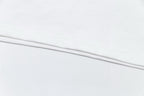 White T-shirt hem seam detail