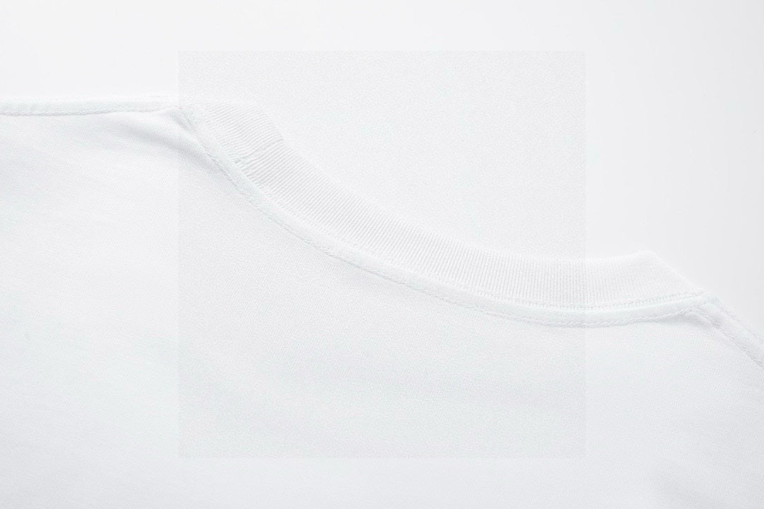 Close-up of white T-shirt neckline and collar stitching