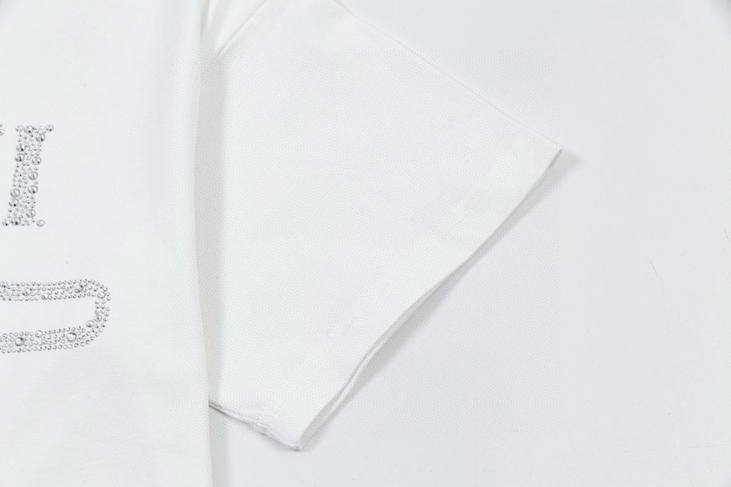 White Gucci T-shirt with rhinestone-style partial logo on sleeve and chest
