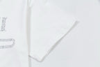 White Gucci T-shirt with rhinestone-style partial logo on sleeve and chest