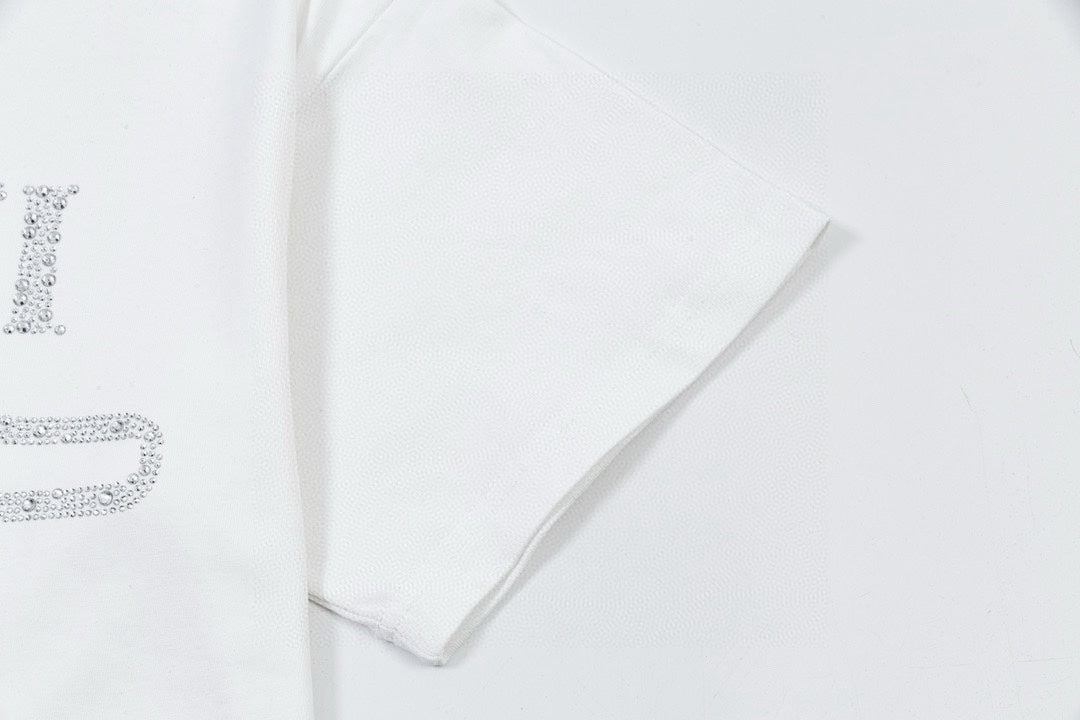 White Gucci T-shirt with rhinestone-style partial logo on sleeve and chest