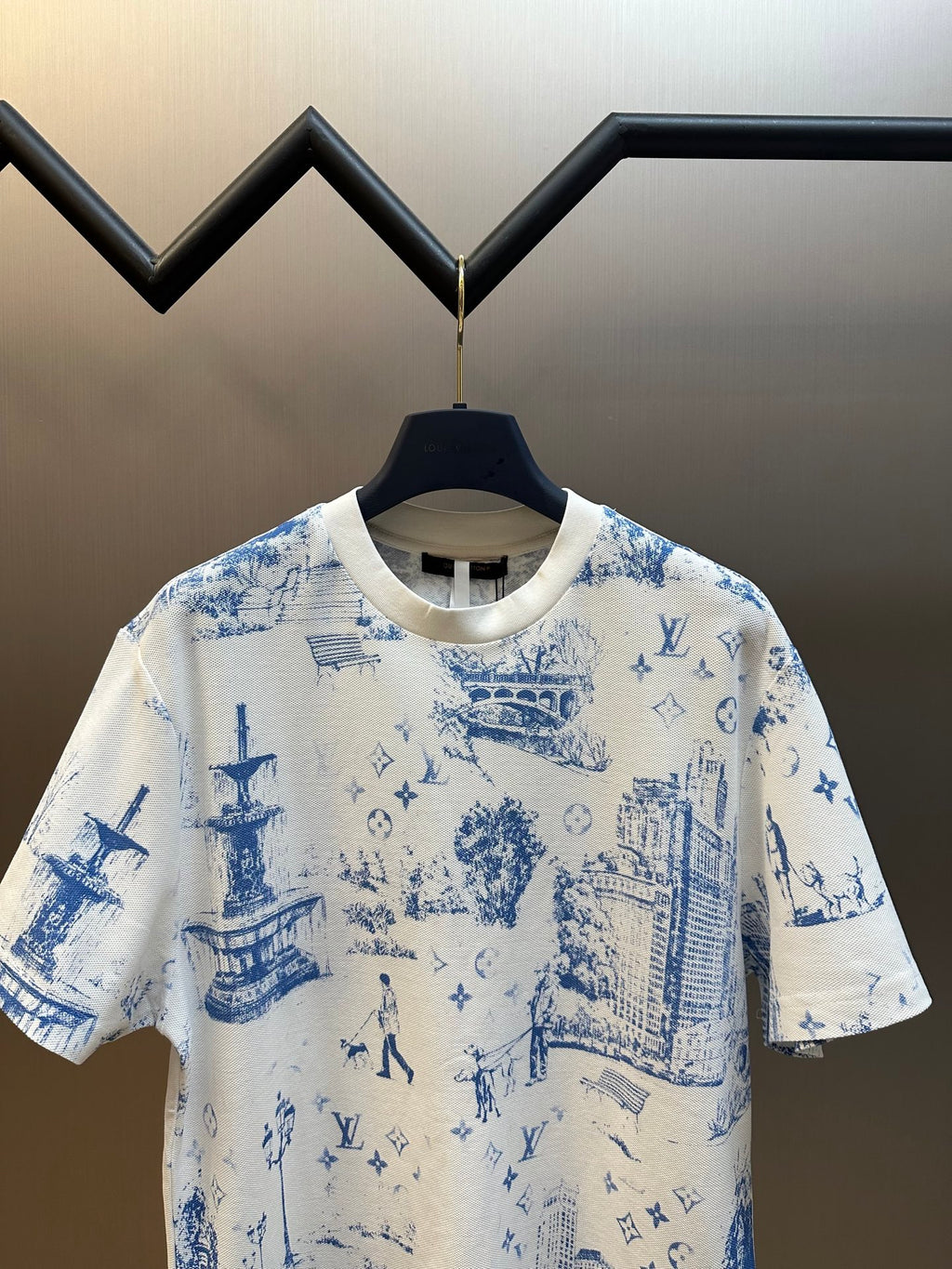 Off-white crew-neck short-sleeve T-shirt with blue allover city and symbol print
