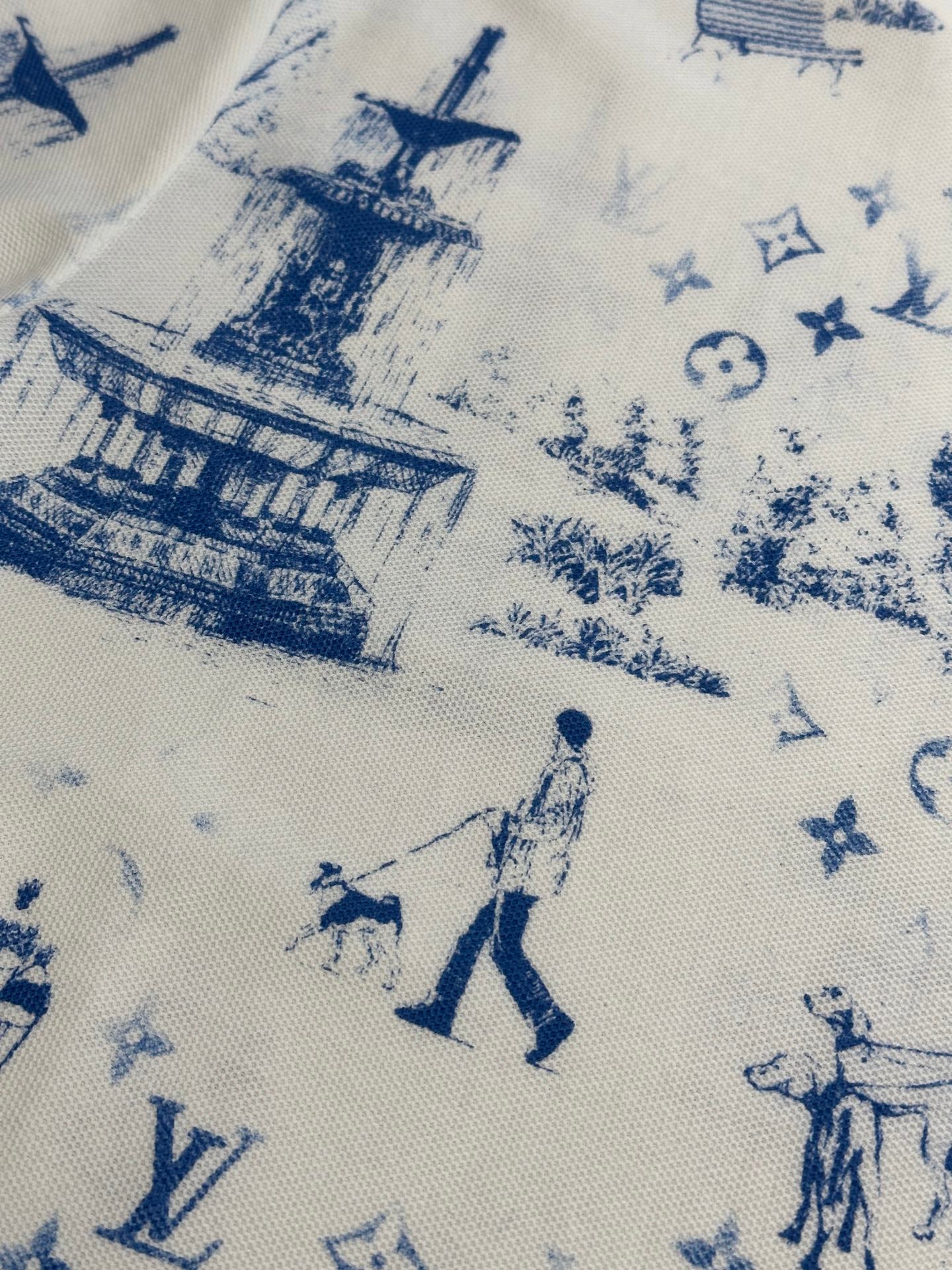 Close-up of off-white fabric with blue toile-style city and figures print