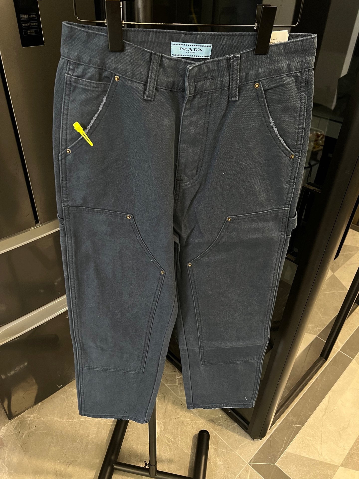 Prada denim cargo pants, medium-dark wash, button fly, multiple side and cargo pockets