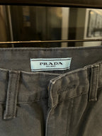 Prada denim pants waistband label, textured fabric with button fly and belt loops