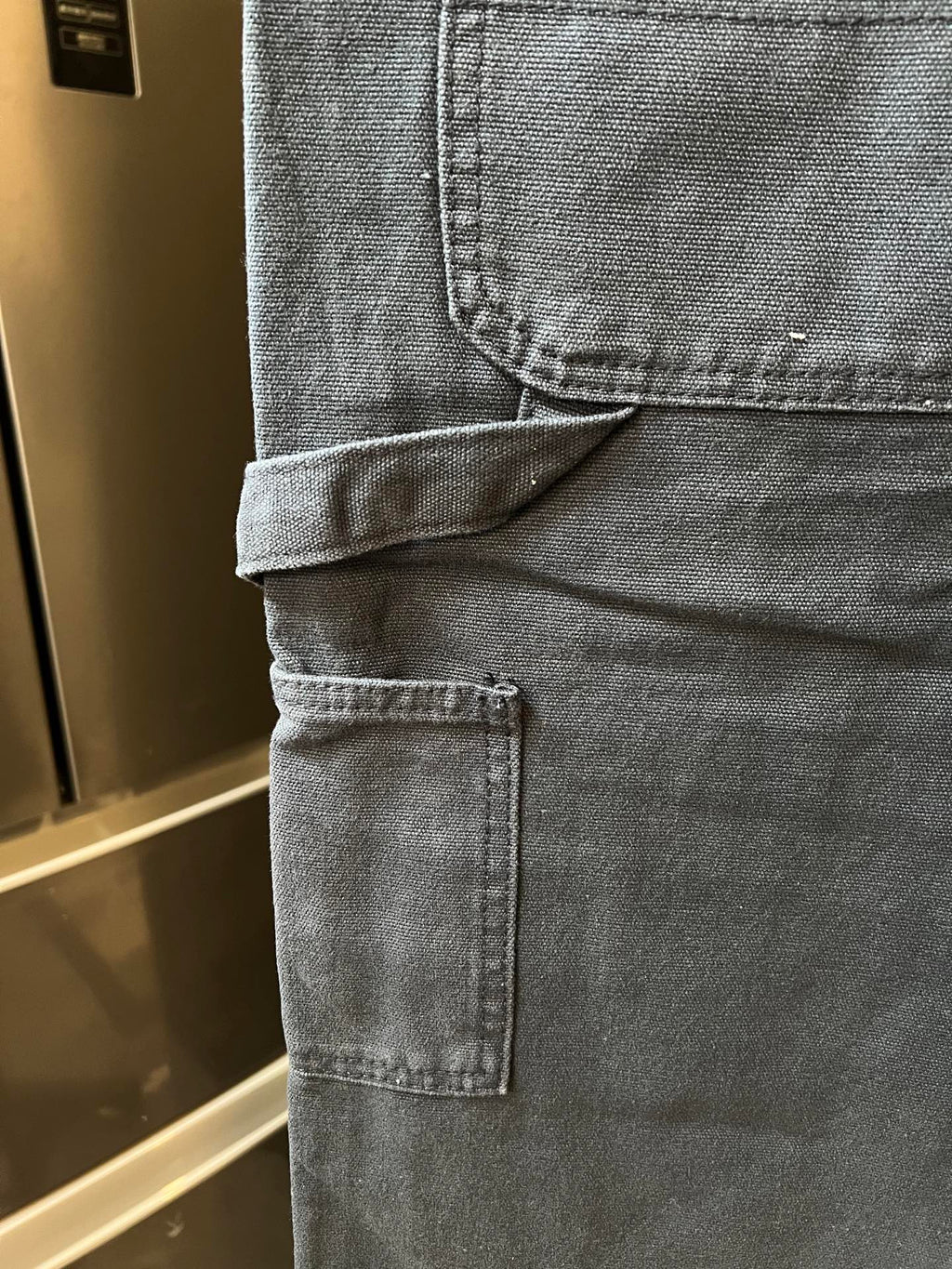 Prada denim pants, cuff and side seam detail with back patch pocket