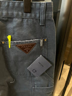 Prada denim cargo pants, dark wash, front logo patch, cargo pocket with button detail