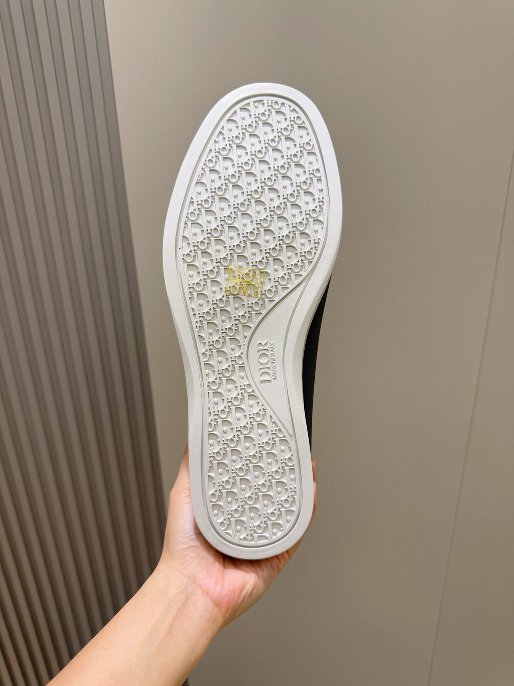 White patterned outsole of a Dior loafer with textured tread