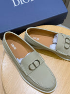 Beige loafer interior with Dior logo and silver-tone D buckle
