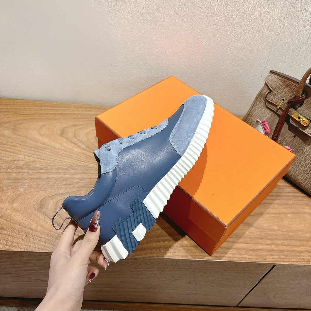 Unisex light-blue high-traction sneakers with white tread sole and lace-up upper