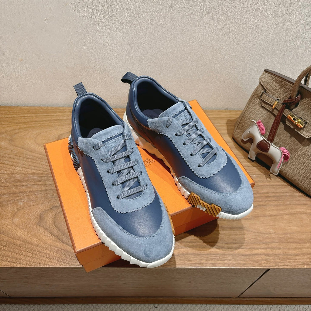 Unisex light-blue sneakers shown at an angle, with lace-up front and white tread sole