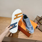 Unisex sneakers outsole view: white tread sole with ridges and traction pattern