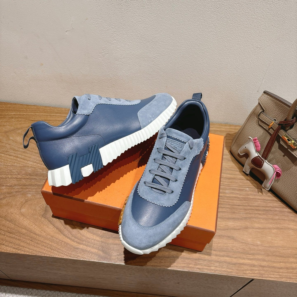 Unisex light-blue sneakers with thick white sole and lace-up upper