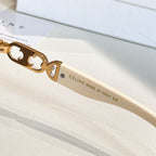 Celine sunglasses side view: gold hinges and Celine made in Italy text on arm