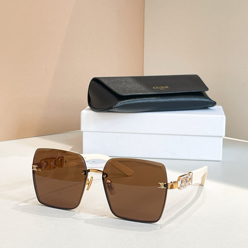 Celine sunglasses with dark brown frames and amber lenses, gold chain-link temple