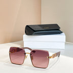 Celine sunglasses with rose frames and pink lenses, gold chain-link temple detail