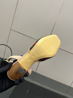 Women's Louis Vuitton slingback heel outsole, beige bottom with logo and patterned tread