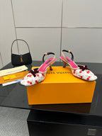 Heeled slingback shoes with white cherry pattern, fuchsia lining, and slingback strap.