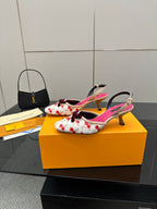 Heeled slingback shoes, white cherry print with bow, fuchsia straps, and mid heels.