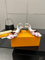 Women's slingback shoes with white cherry-pattern fabric and ankle strap detail