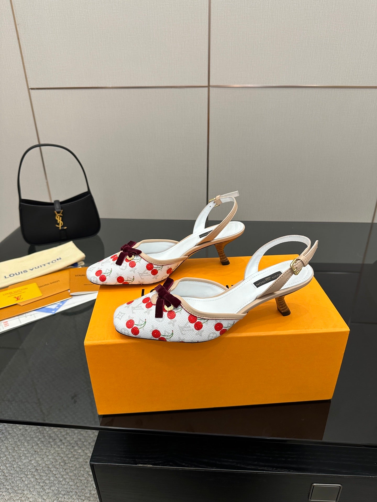Women's slingback pump shoes with red cherry print, white straps and mid heel