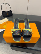 Louis Vuitton slide sandals with multicolor monogram, neon green trim, and bow strap