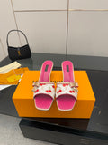Pink and white cherry print heeled slide mules with gold tassel detail