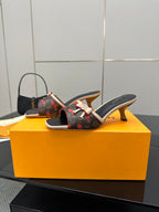 Louis Vuitton slide mule sandals with block heel, multicolor monogram fabric and bow strap