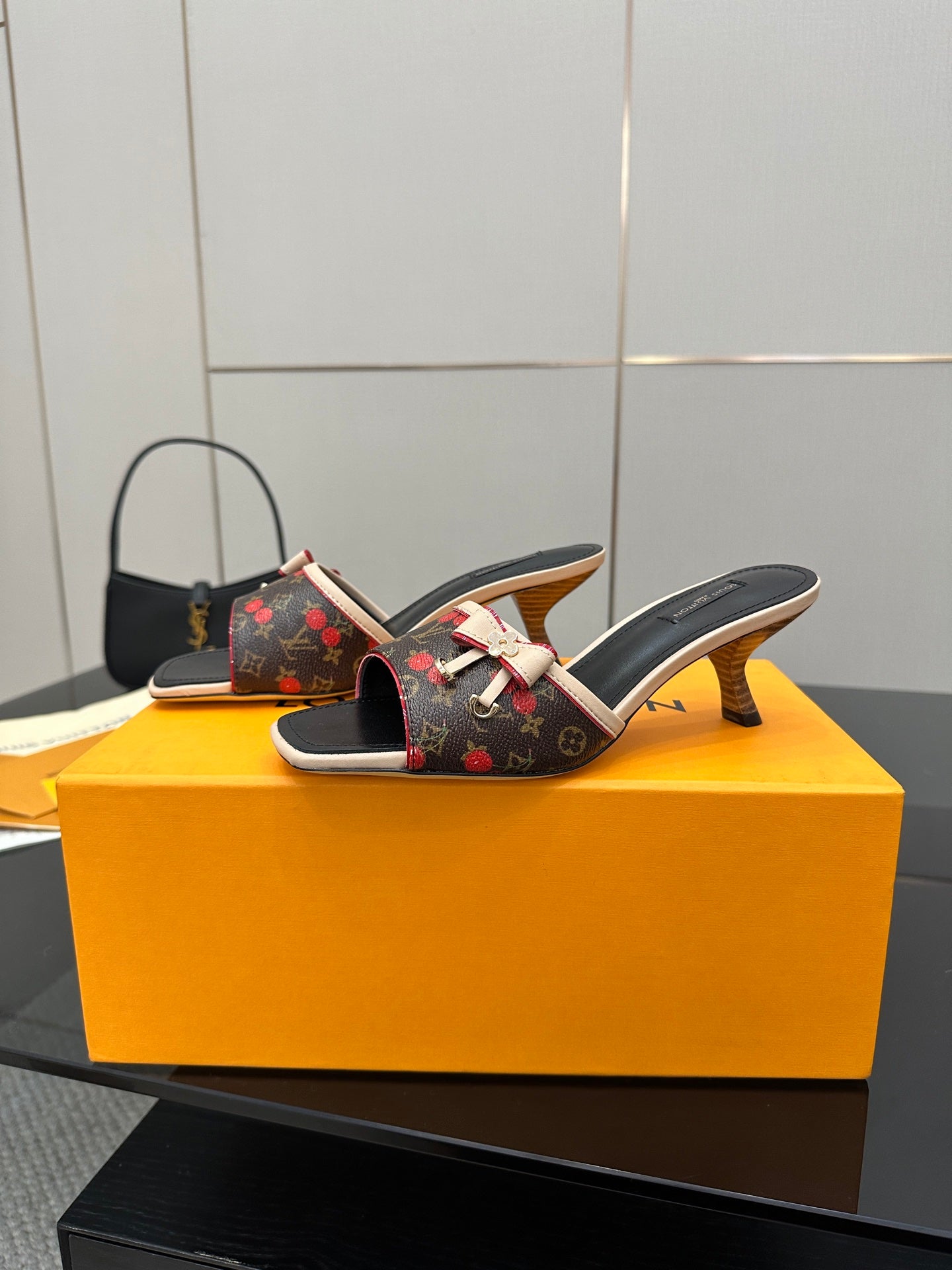 Louis Vuitton slide mule sandals with block heel, multicolor monogram fabric and bow strap