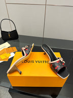 Louis Vuitton ladies slide mules, black with red cherry pattern, beige sole detail