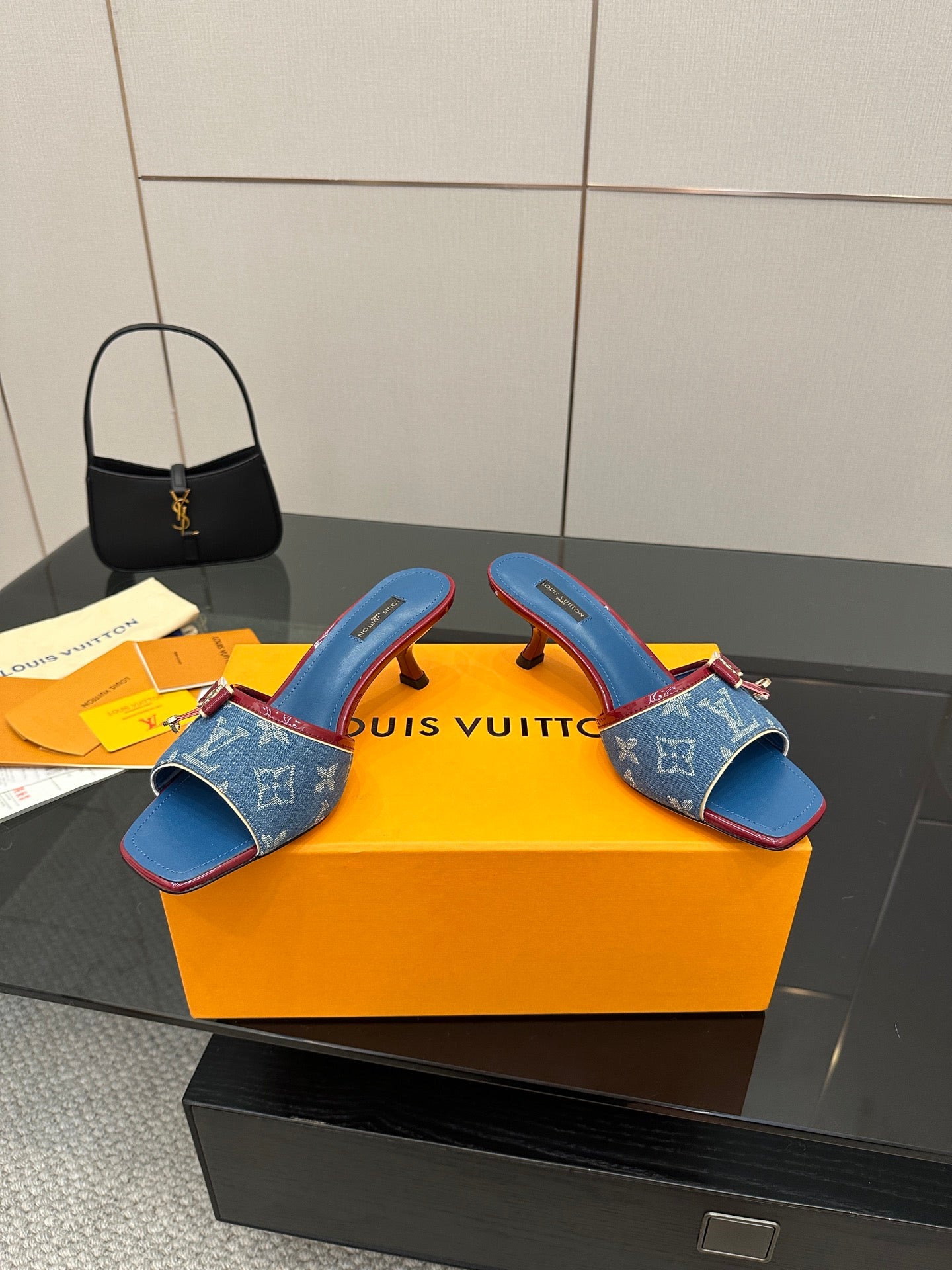 Louis Vuitton women's blue monogram heeled mules with red trim and gold-tone bow