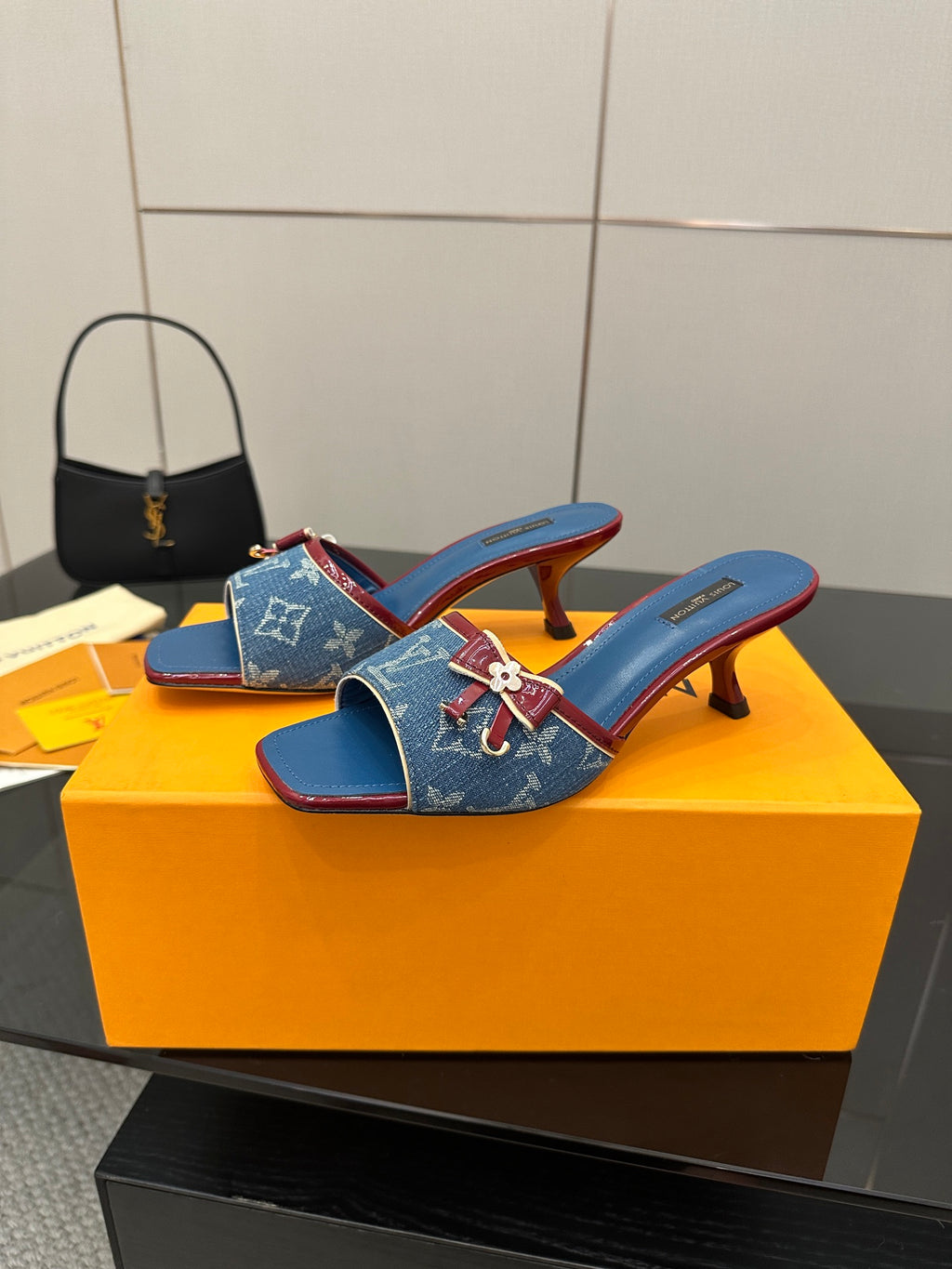 Louis Vuitton women's blue monogram slide mules with bow detail and mid heel