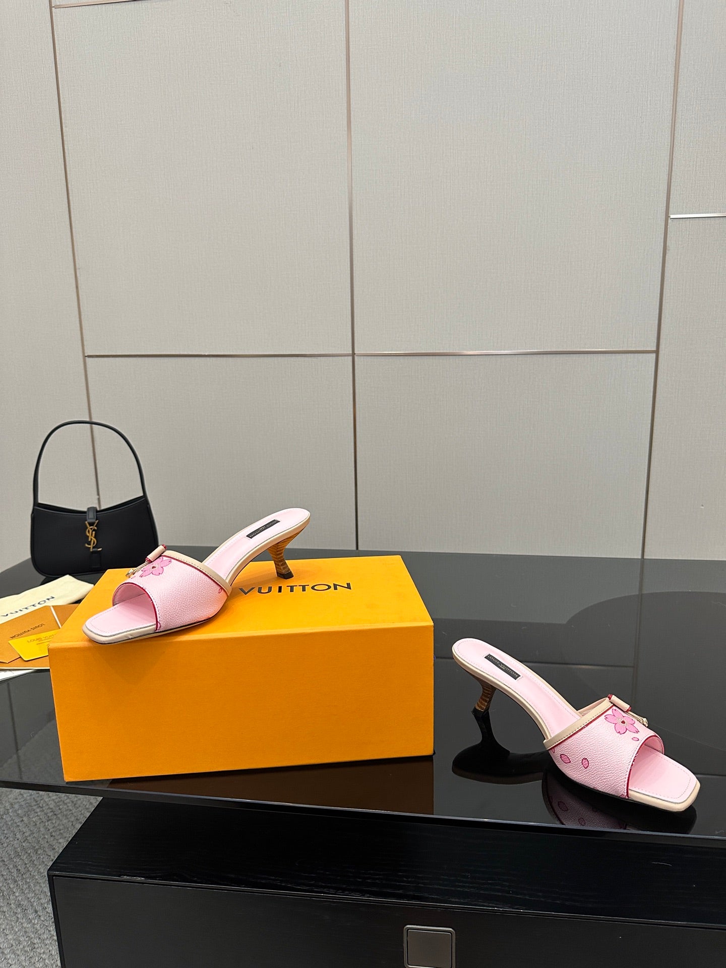 Pink slide sandals with floral strap detail and mid block heel
