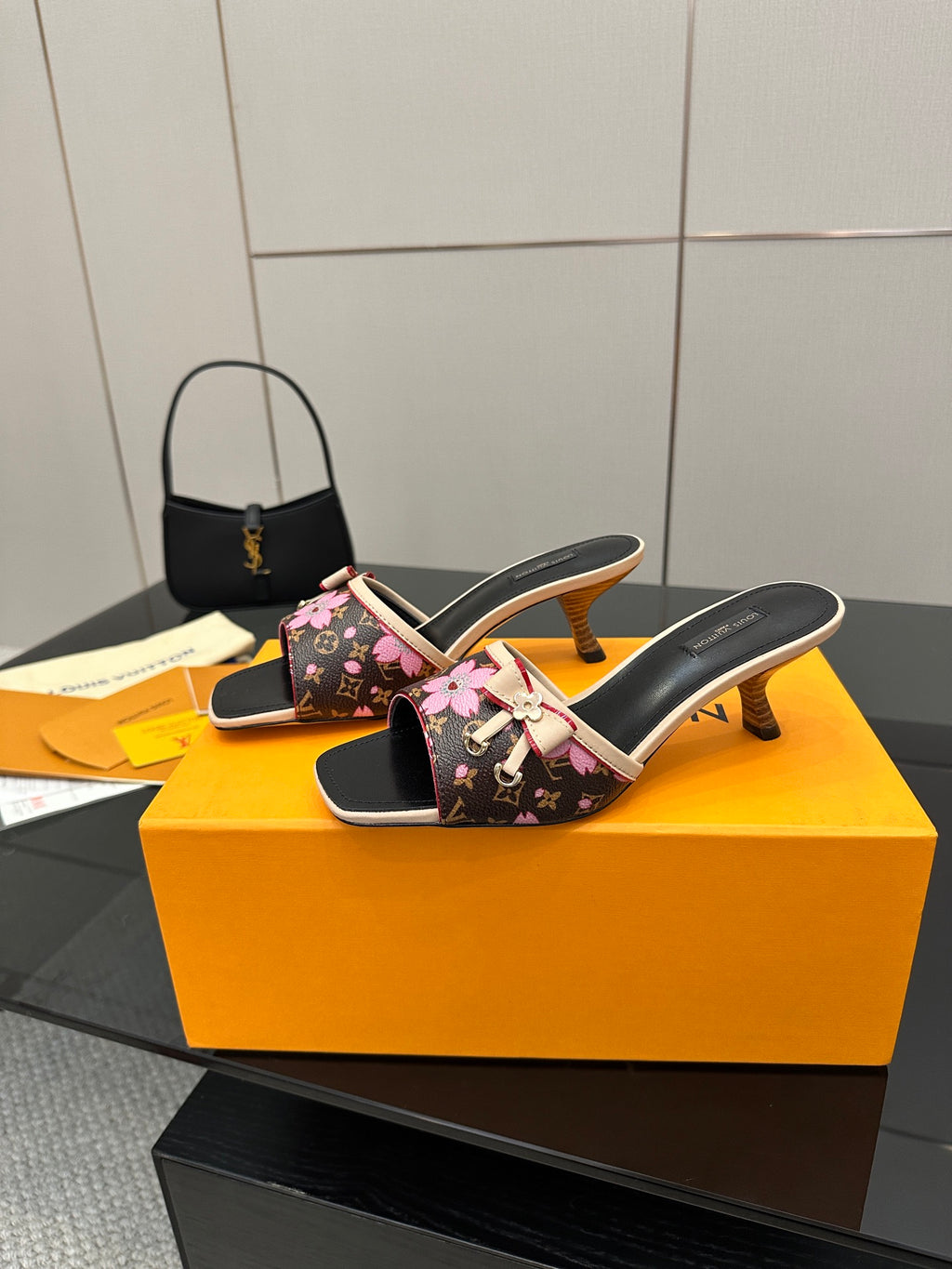Women's heeled mules, black floral canvas with pink bows and block heel, slide style