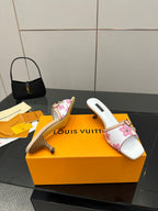 Louis Vuitton women’s mule slides, white base with pink flower pattern and sculpted heel
