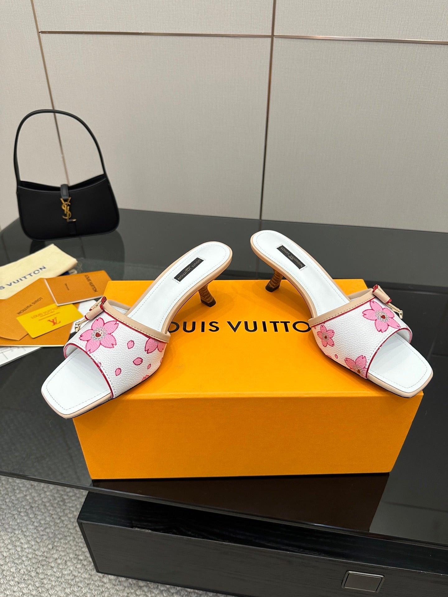 Louis Vuitton women’s pink floral mule shoes with white open toe and tan bow charm